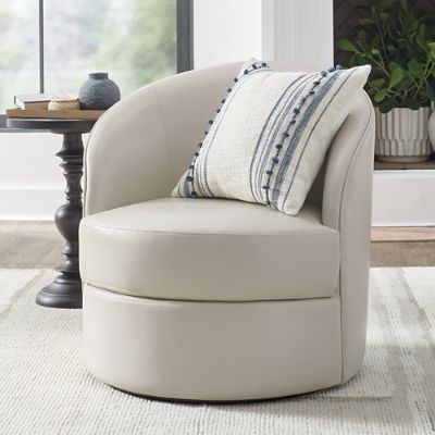 Swivel chair with online ottoman